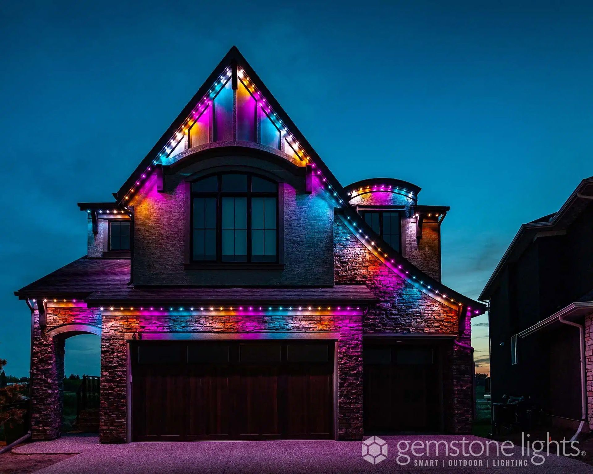 House with exterior colorful lighting