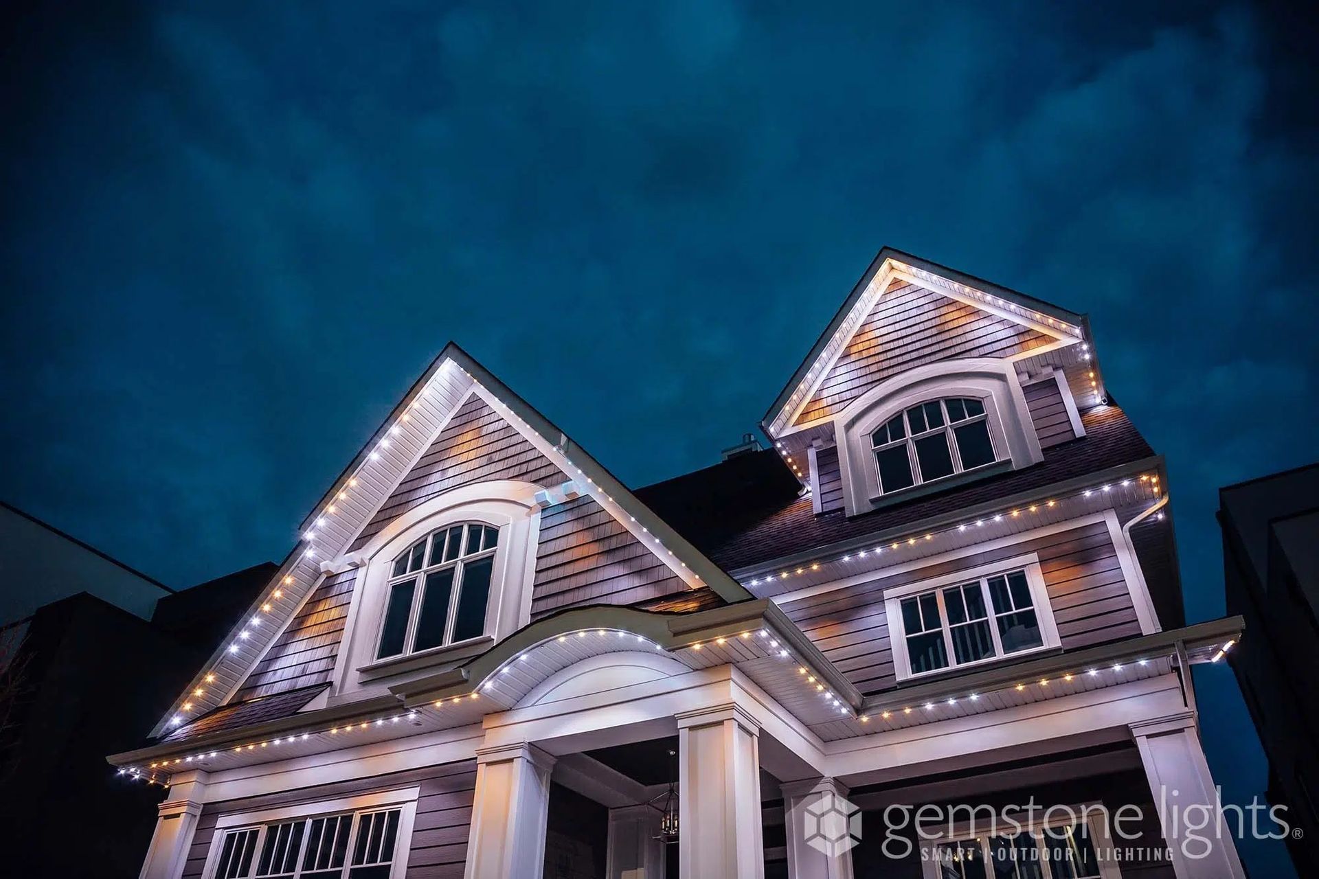 Home with exterior lighting