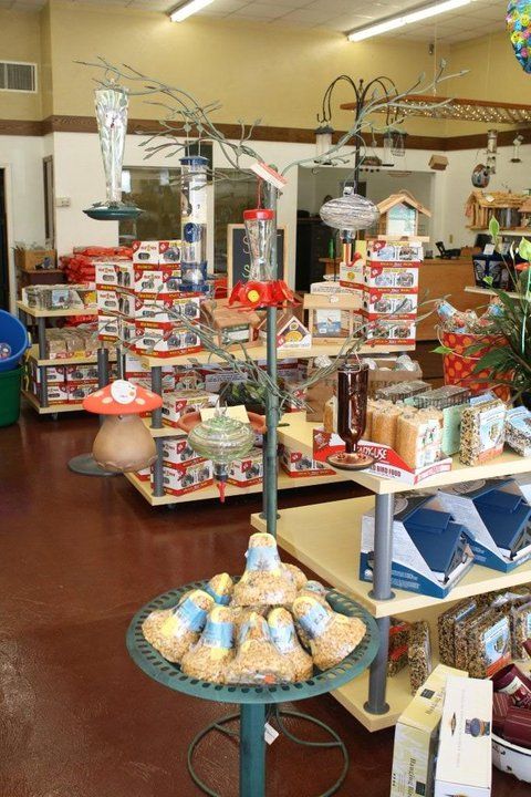 A store filled with lots of bird feeders and other items
