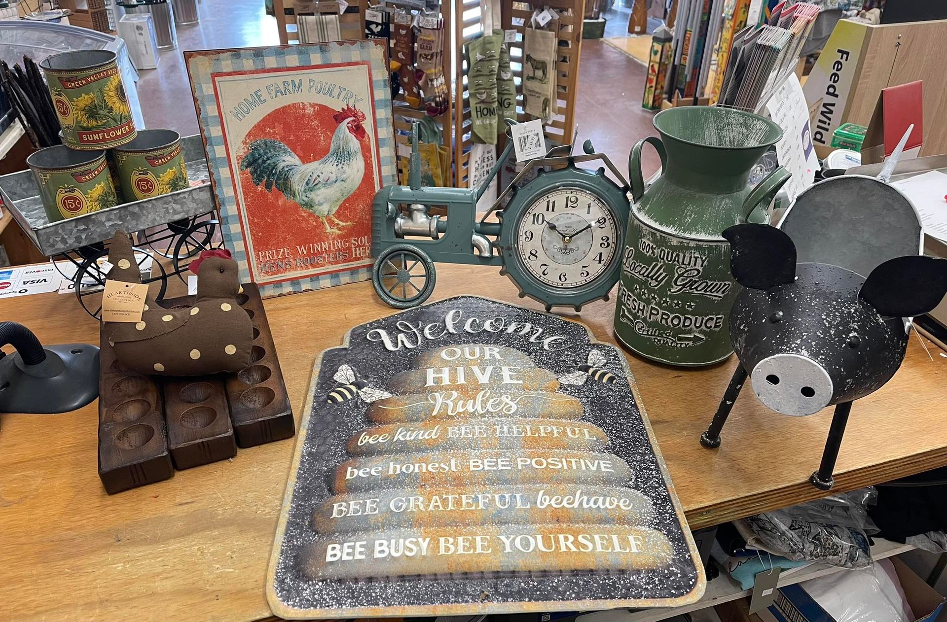 A table with a sign that says welcome for hive