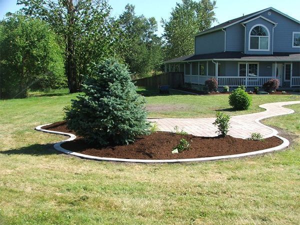 A house with a walkway in front of it