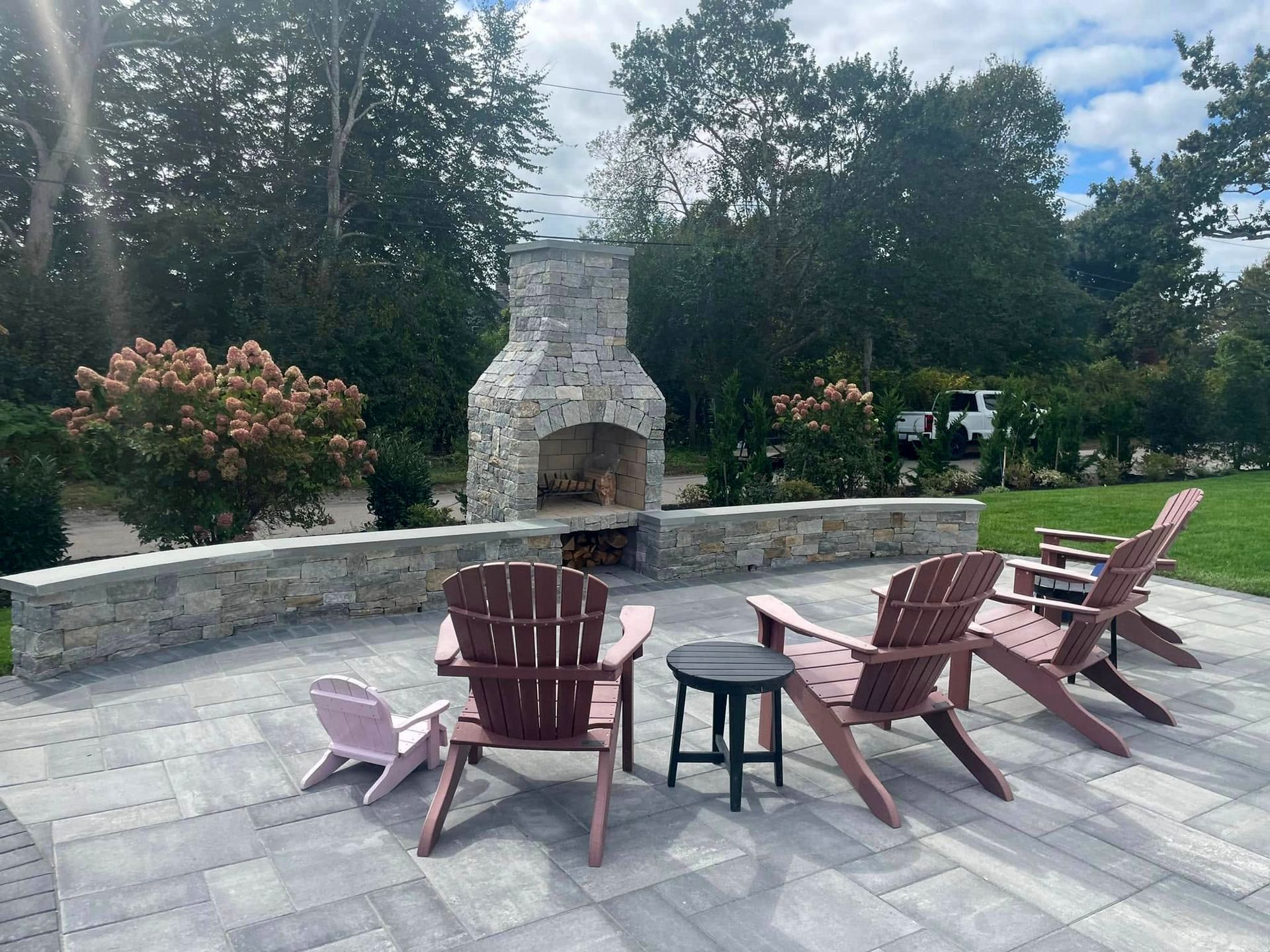 A house with a lot of trees in front of it