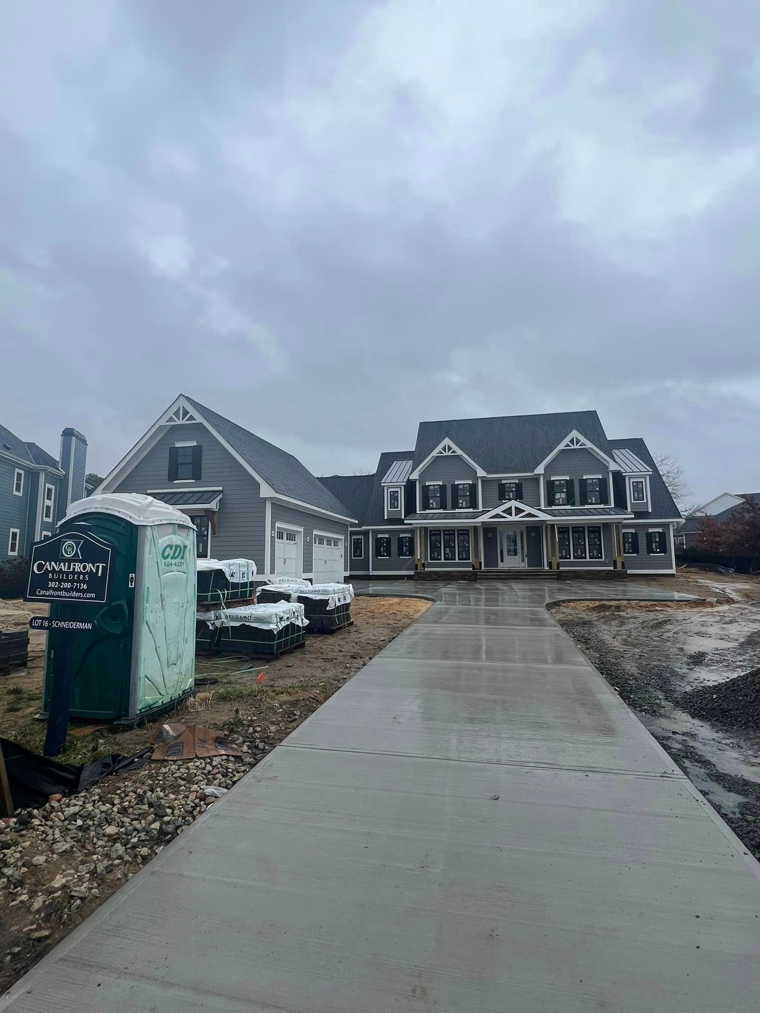 a large empty room with a lot of windows and carpet .