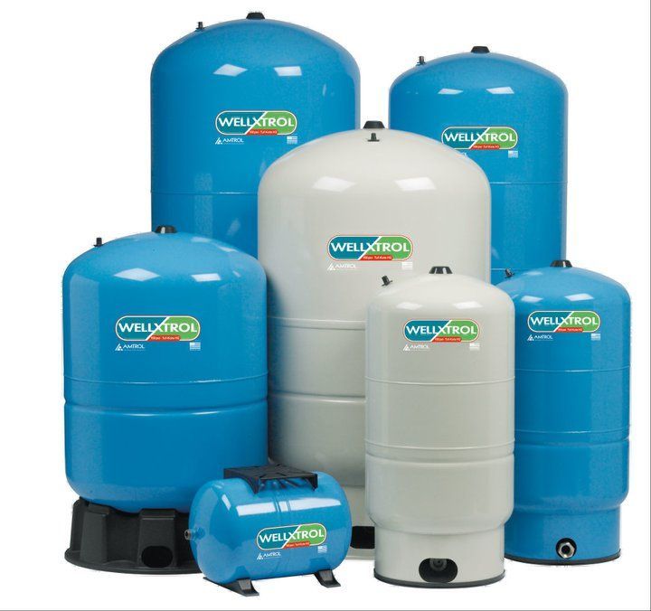 A group of welltrol water tanks of different sizes
