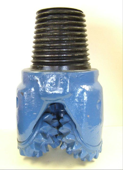 A blue drill bit with a black screw on top of it