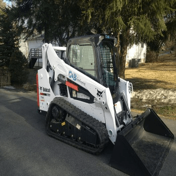 Snow plowing tractor