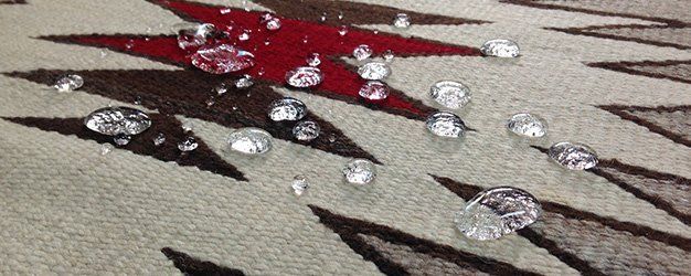 Rug with water droplets
