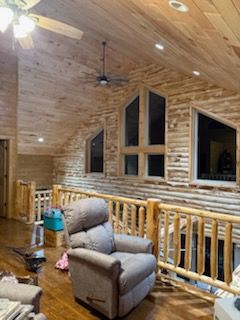 A living room in a log cabin