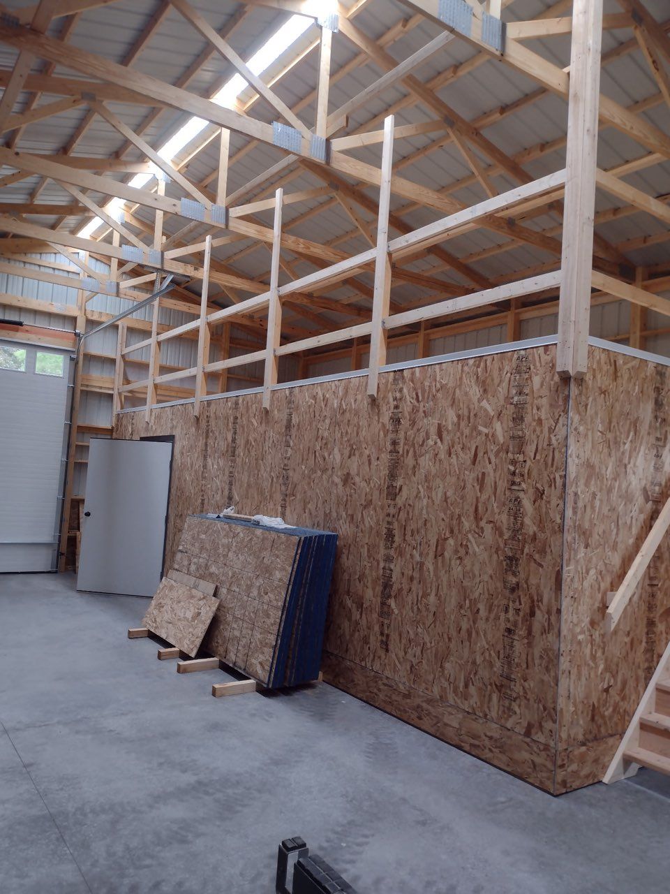 An interior view of a shed under construction