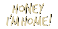 Cream-colored handwritten text reading “HONEY I’M HOME!” on a white background