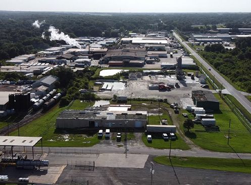 An aerial view of a large industrial area with lots of buildings