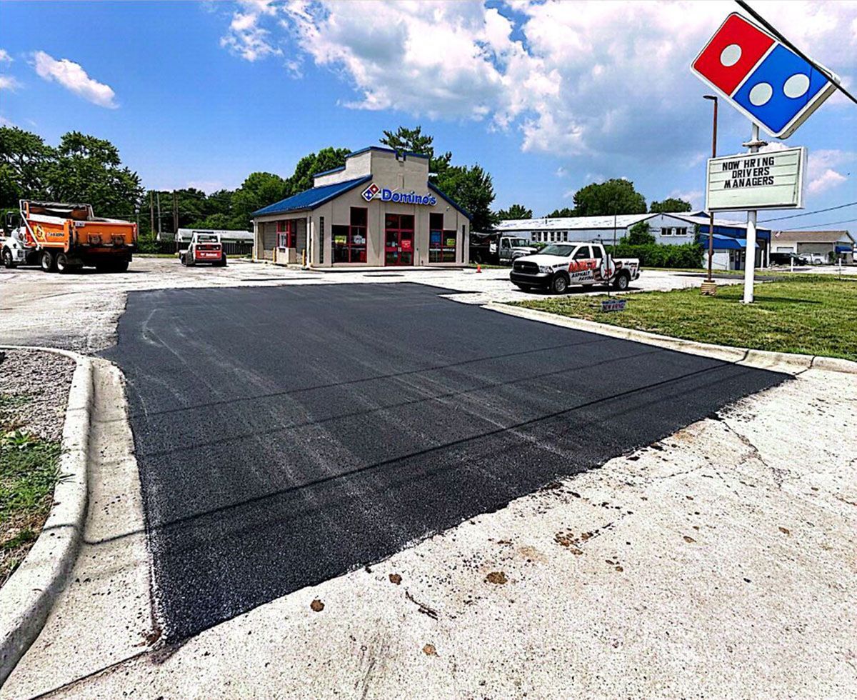 A newly paved asphalt driveway