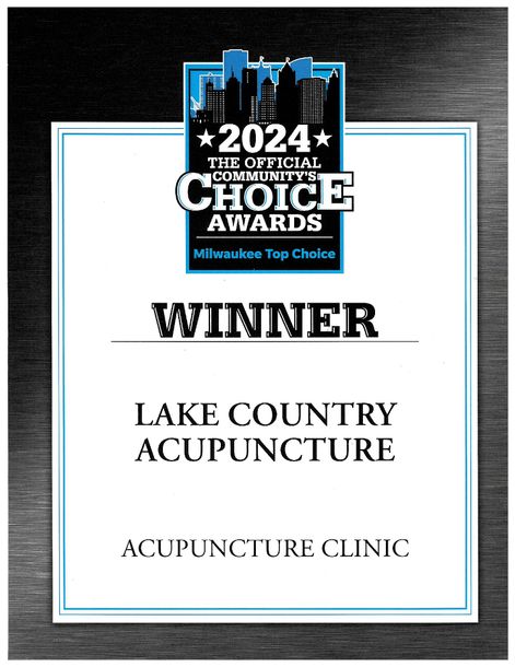 A plaque that says winner lake country acupuncture acupuncture clinic