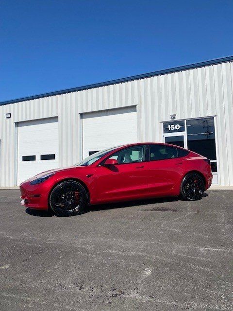 Tesla at Shop Driver Side