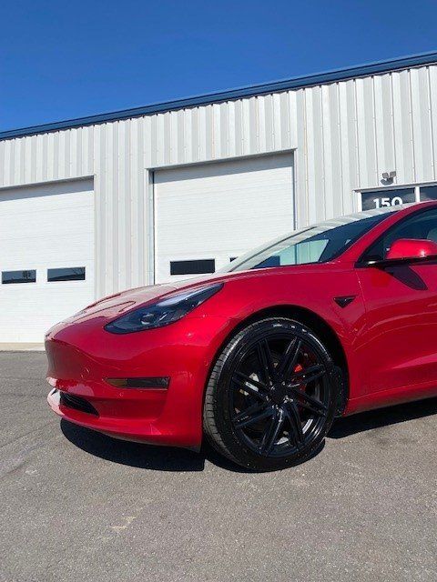 Tesla at Shop Driver Front Wheel