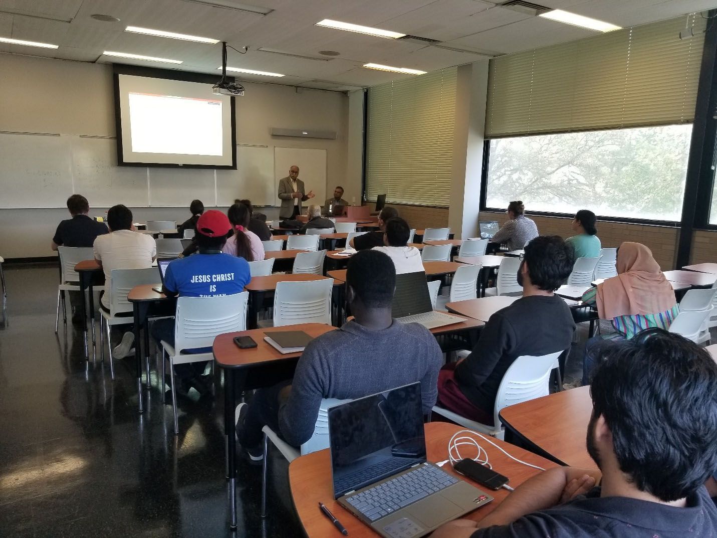 Ajay Gupta speaking to students