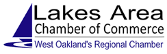 Logo of Lakes Area Chamber of Commerce, includes a sailboat and water graphics, with text