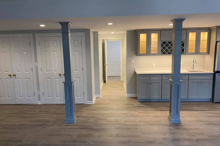 A basement with a kitchen