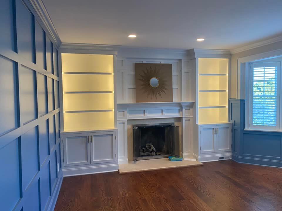 There is a fireplace in the middle of the room.