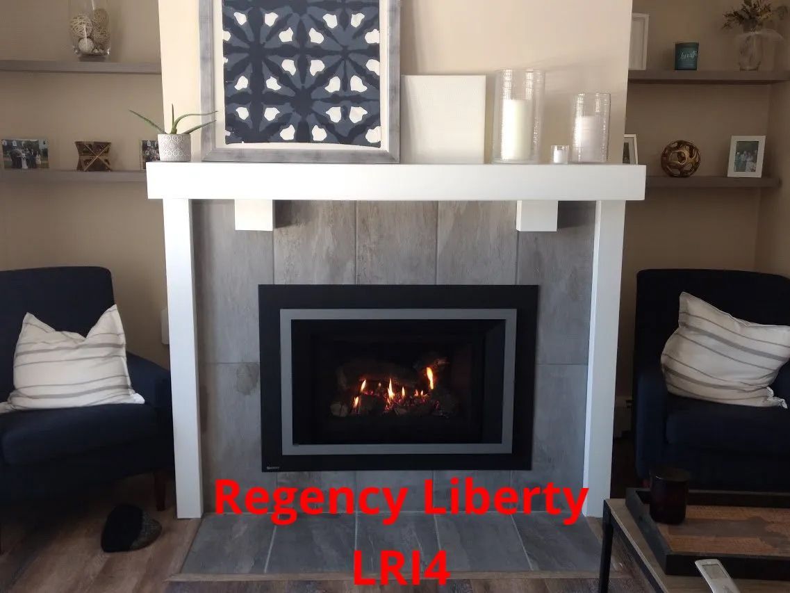 A living room with a fireplace that says regency liberty lr14