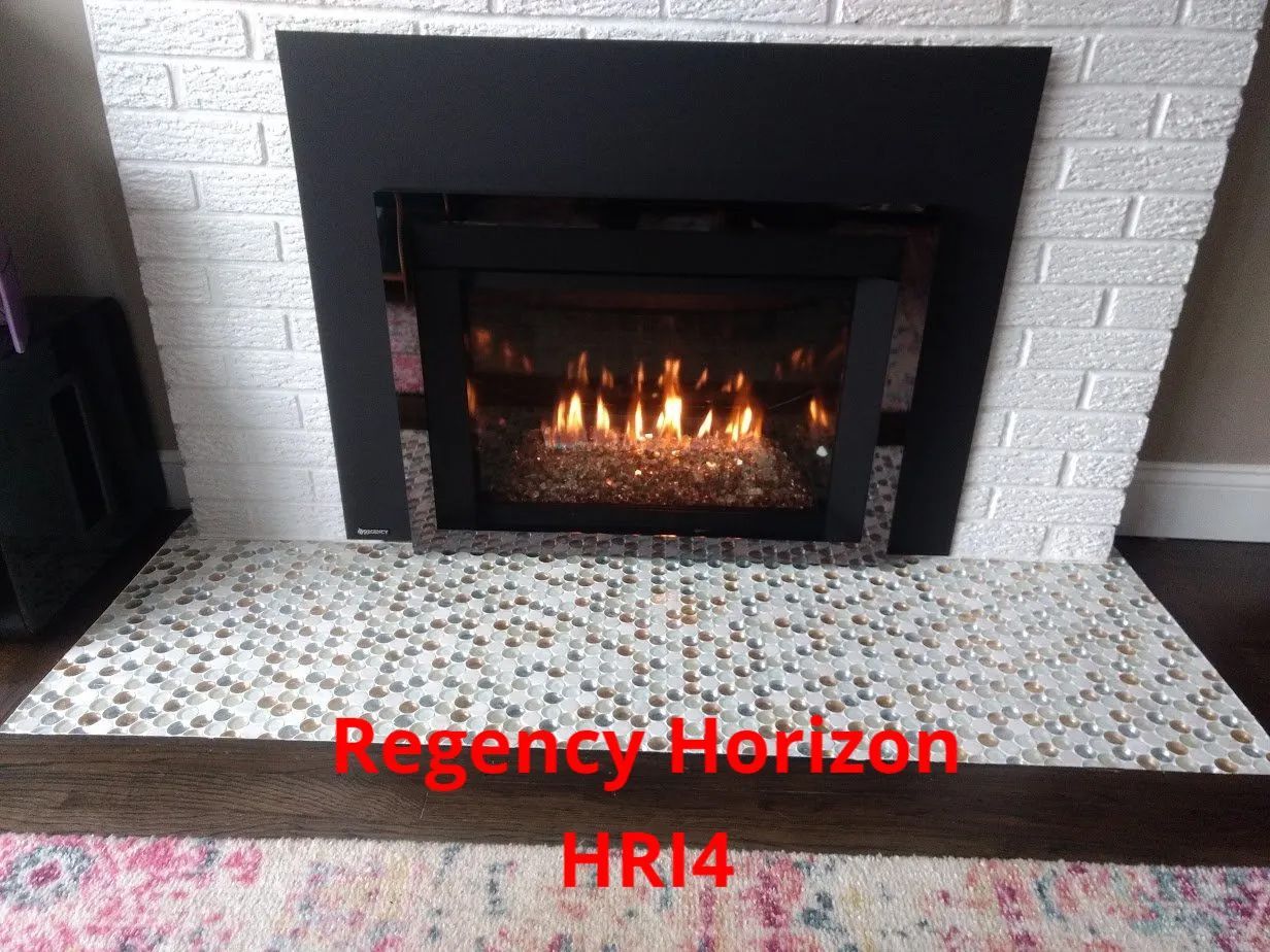 A fireplace with the words regency horizon written on it
