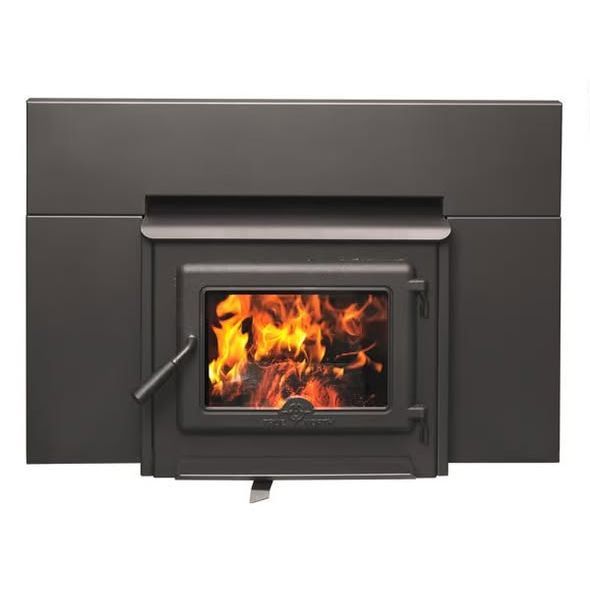 Black wood stove with a glass door showing a bright fire burning inside