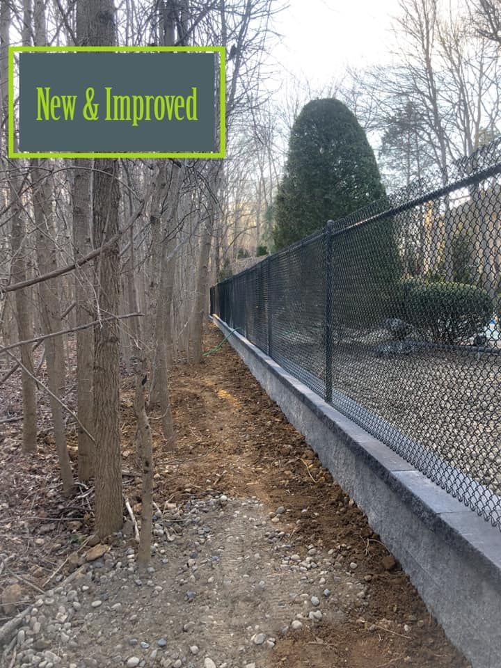A chain link fence with a sign that says new and improved