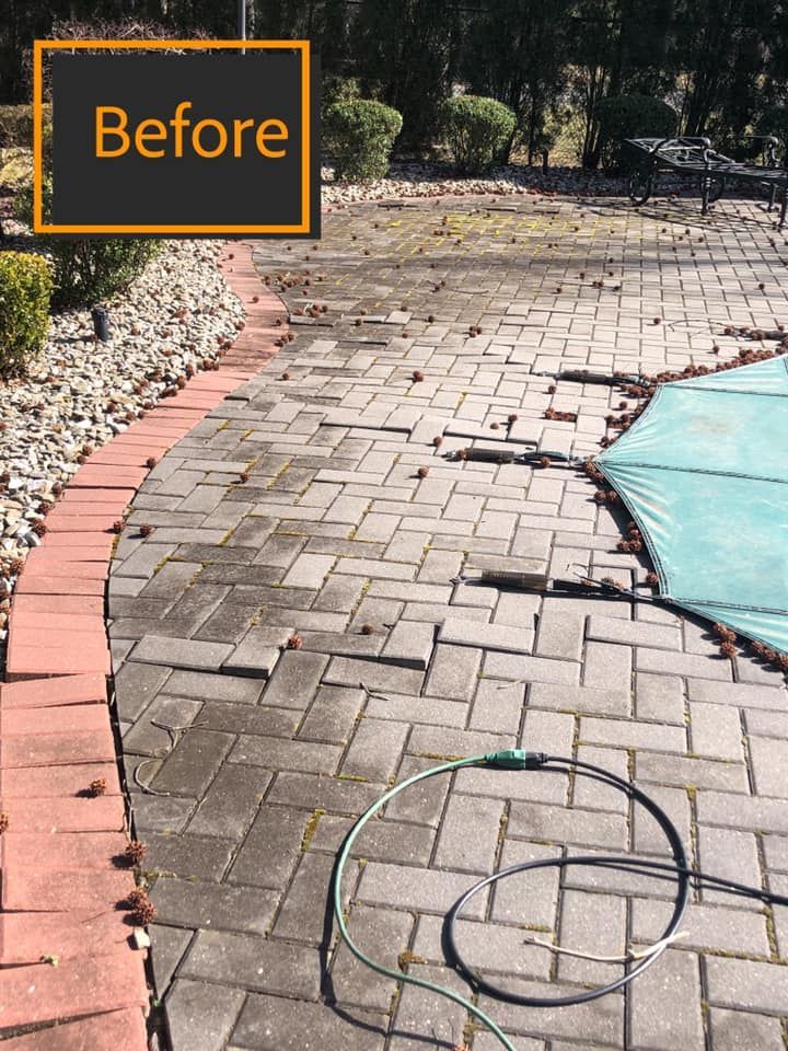A before picture of a brick walkway 