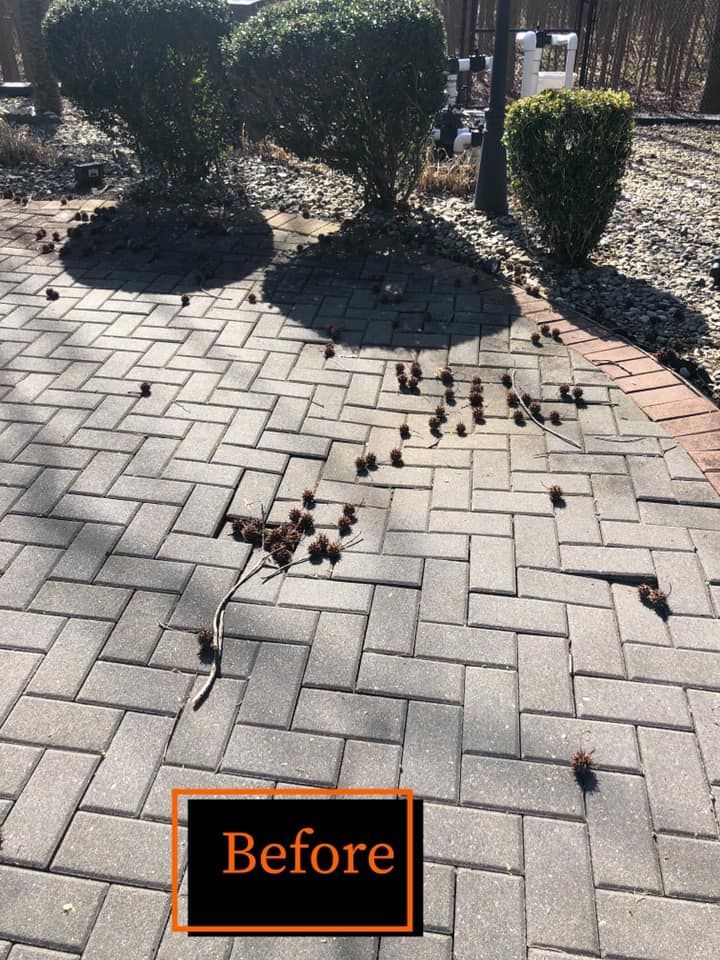 A before picture of a brick walkway 
