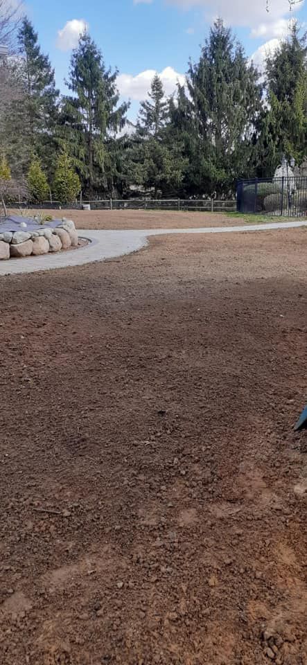 There is a lot of dirt in the middle of the field.