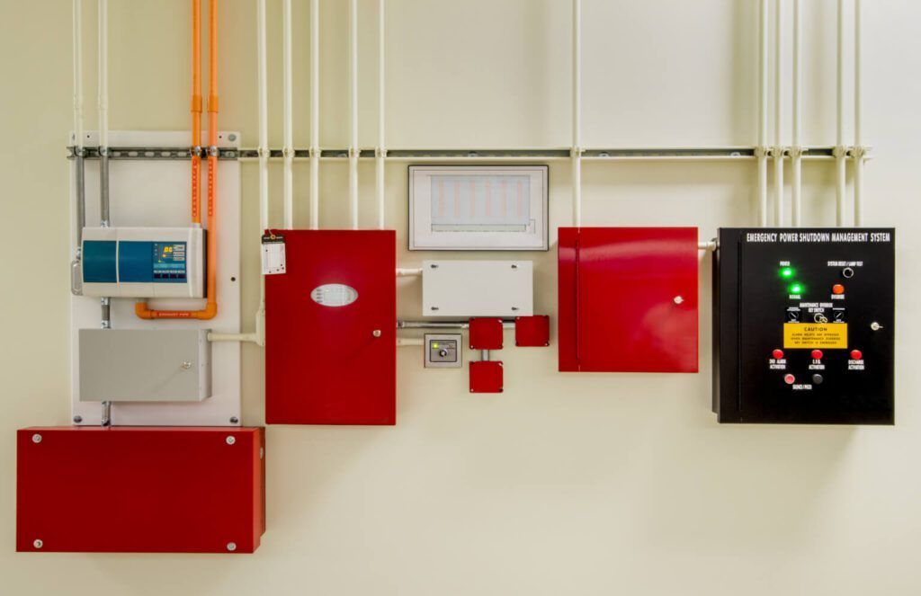 A wall with a bunch of red boxes on it