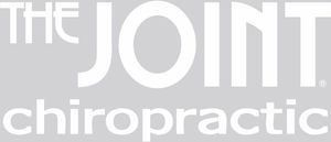 The Joint Chiropractic logo on a gray background.