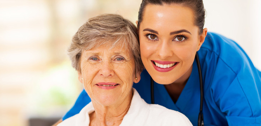 old woman with healthcare provider