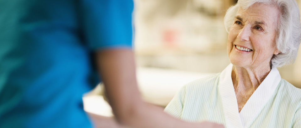 old woman with healthcare provider