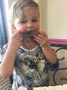 Kid enjoying cake