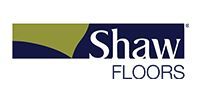 Shaw Floors logo with navy and olive graphic and white text on a light background