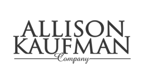A black and white logo for allison kaufman company