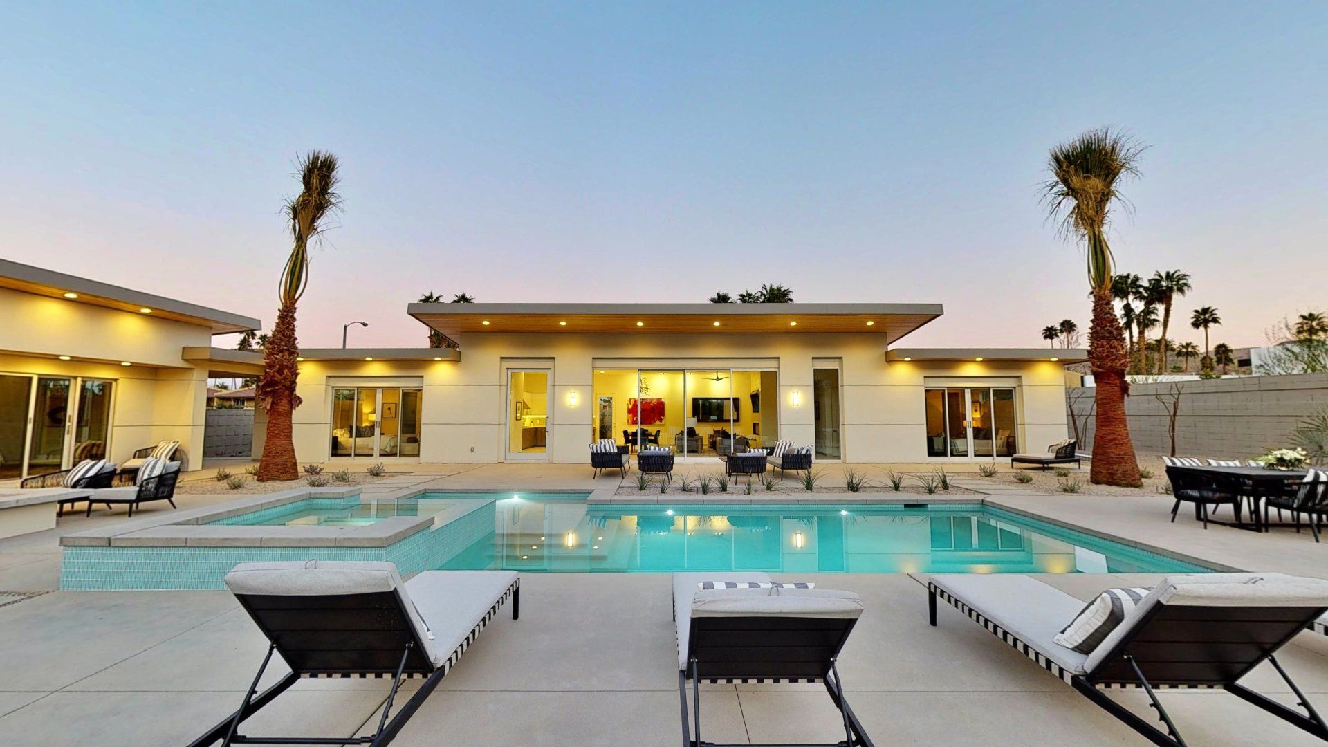 Outdoor pool with lounge chairs
