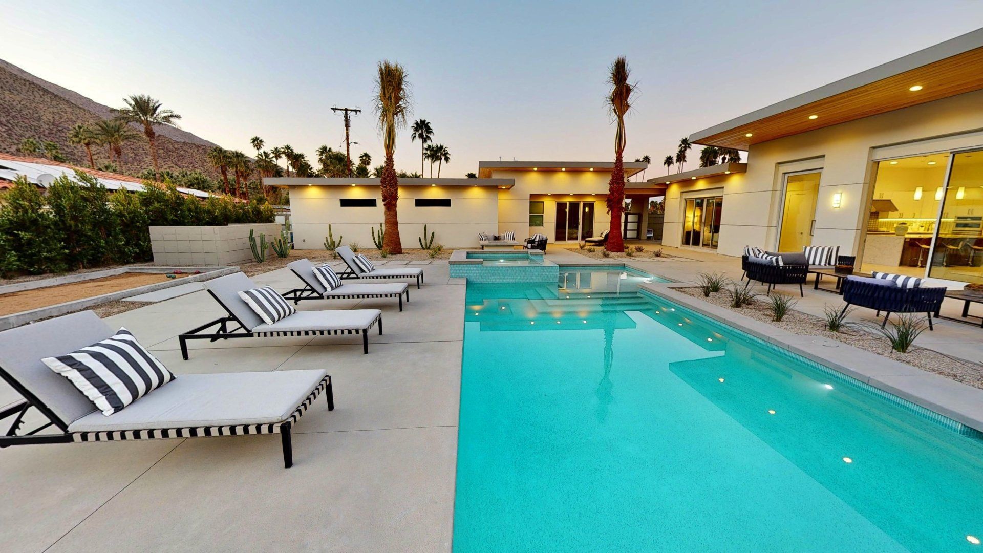 Outdoor pool with lounge chairs