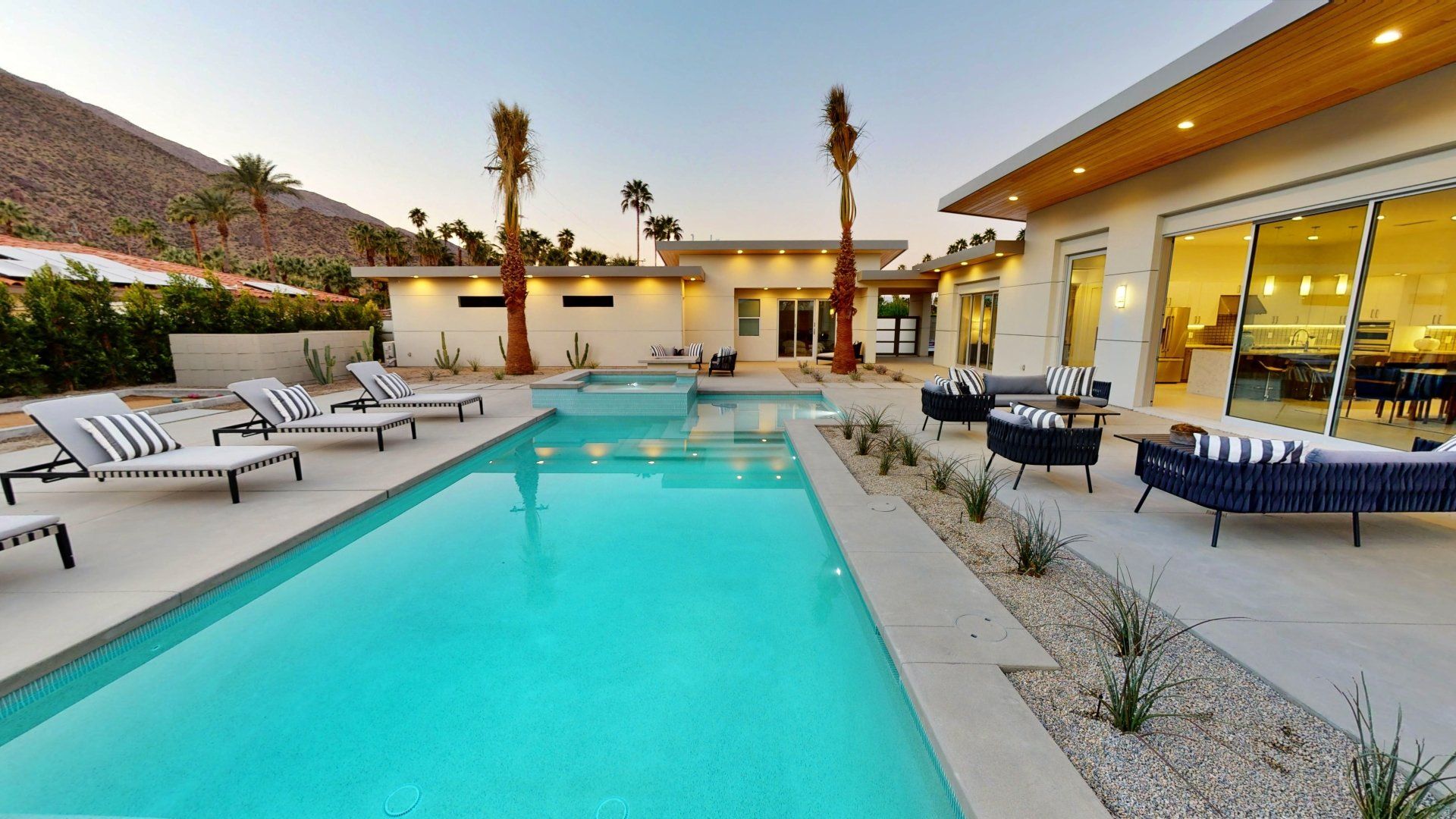 Outdoor pool with lounge chairs