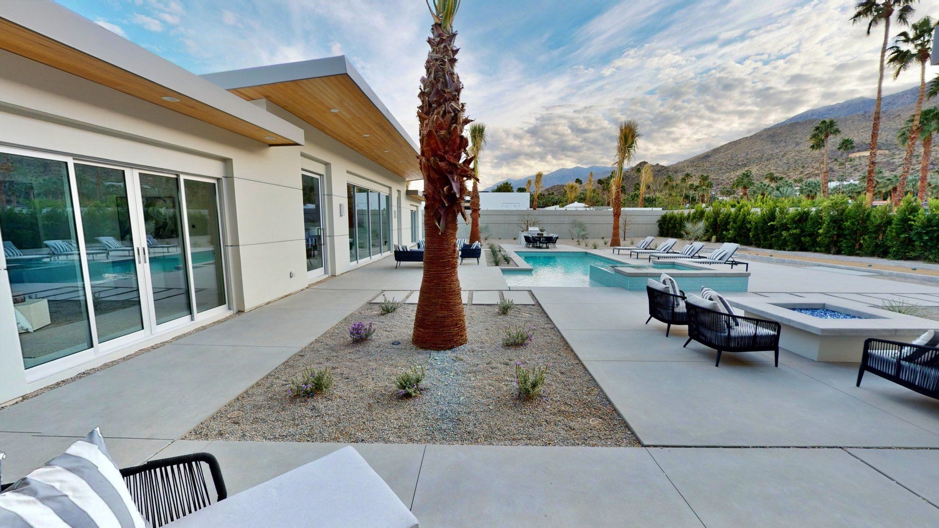 Outdoor pool with lounge chairs