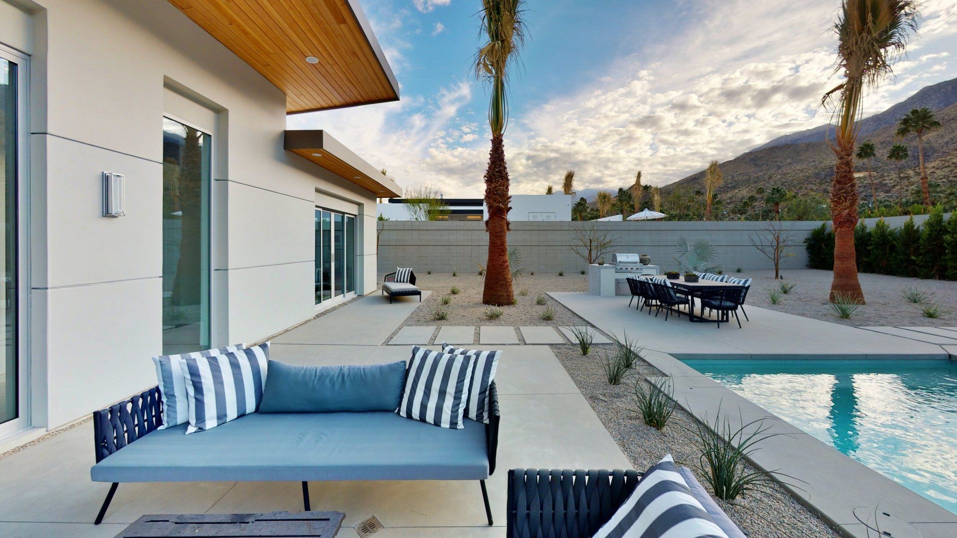 Outdoor pool with lounge chairs