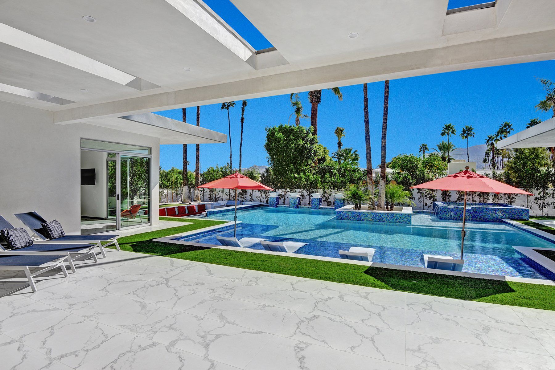 Covered patio to pool and spa and bbq pits