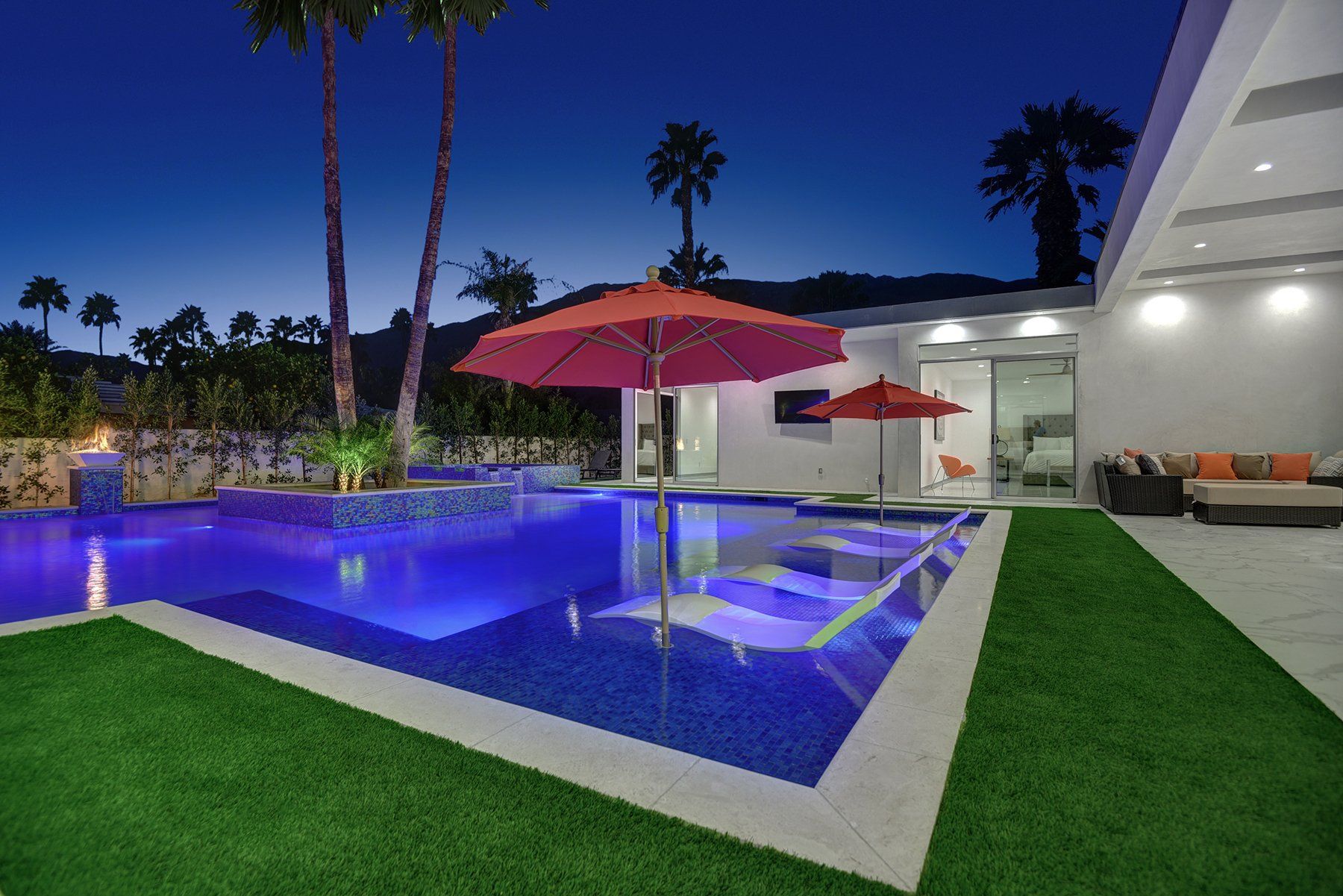 In pool lounges to mountains at night