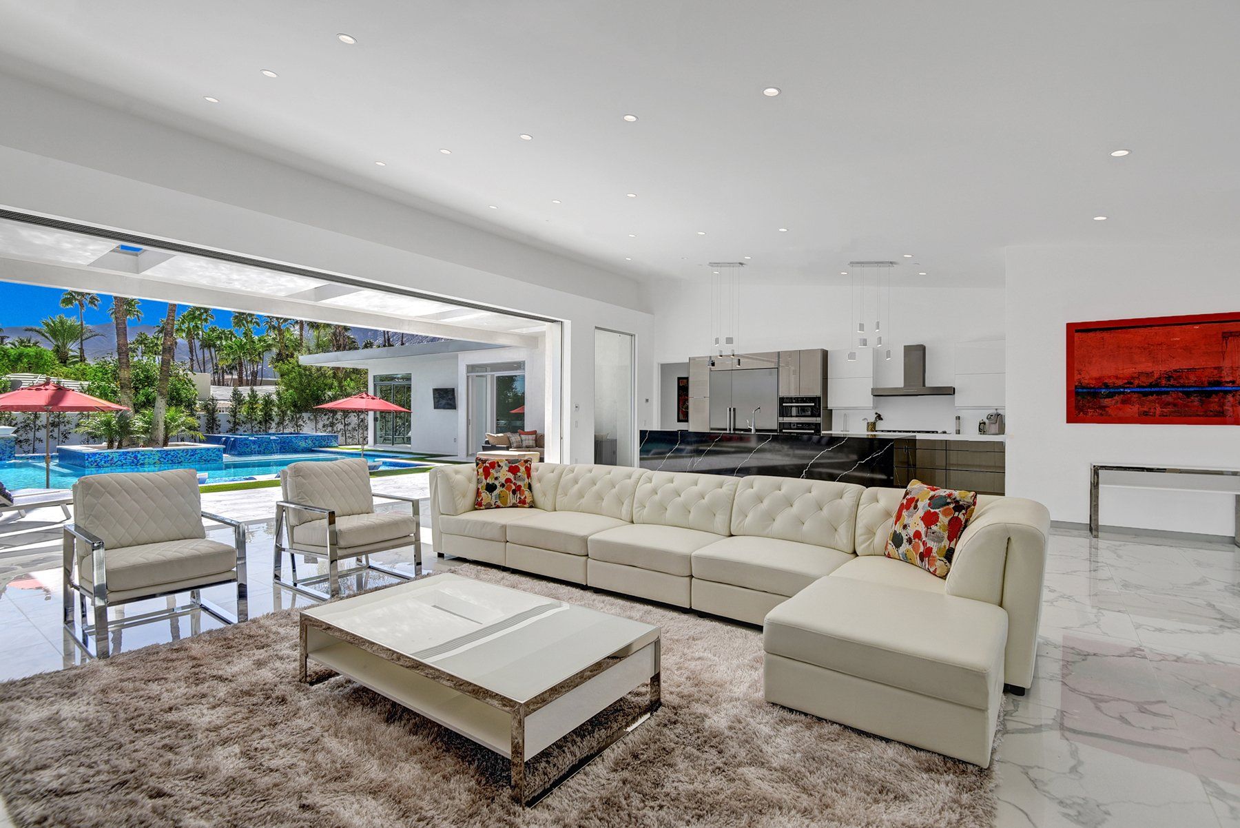 Living room to kitchen and pool