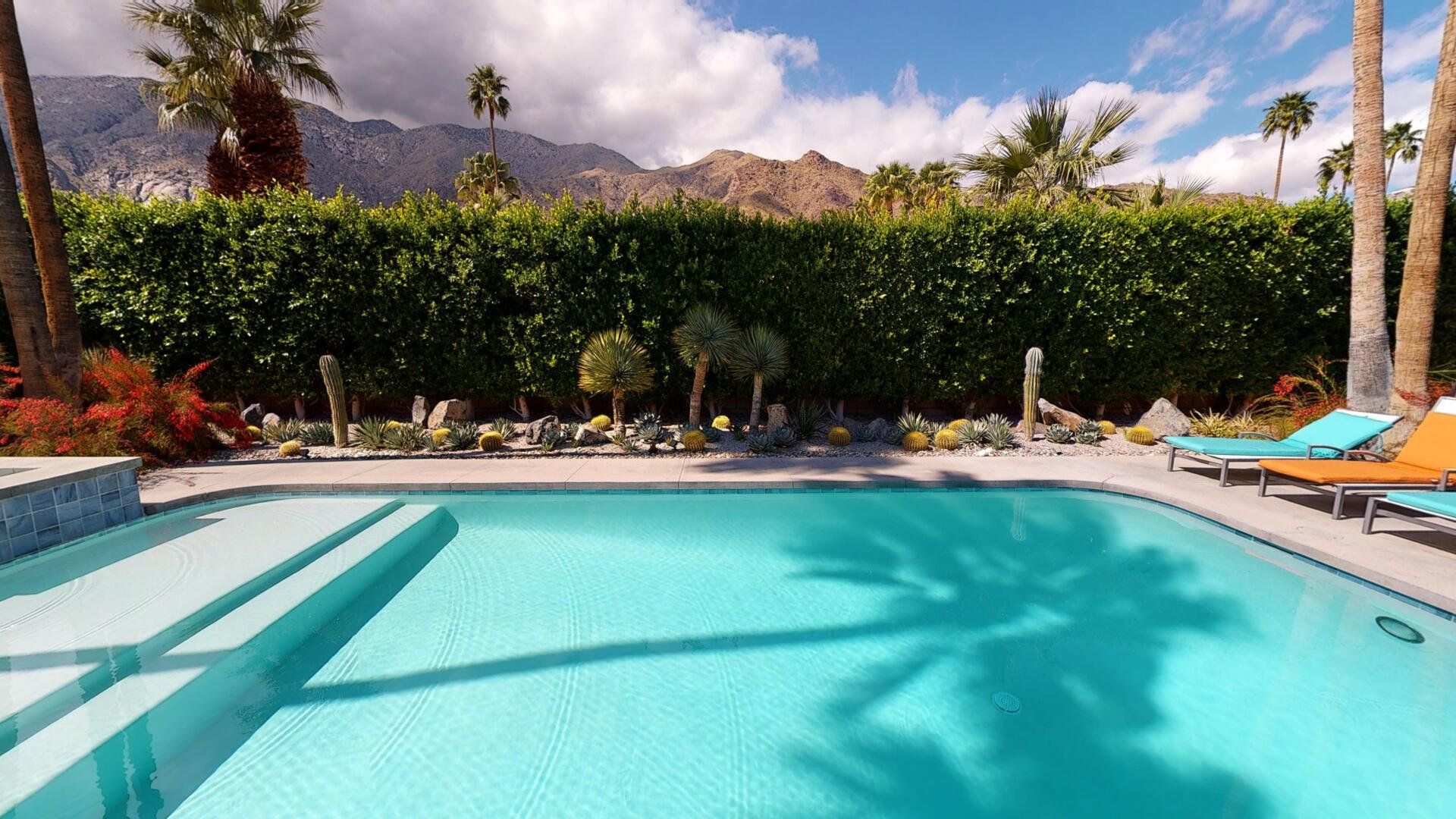 Pool with lounge chairs
