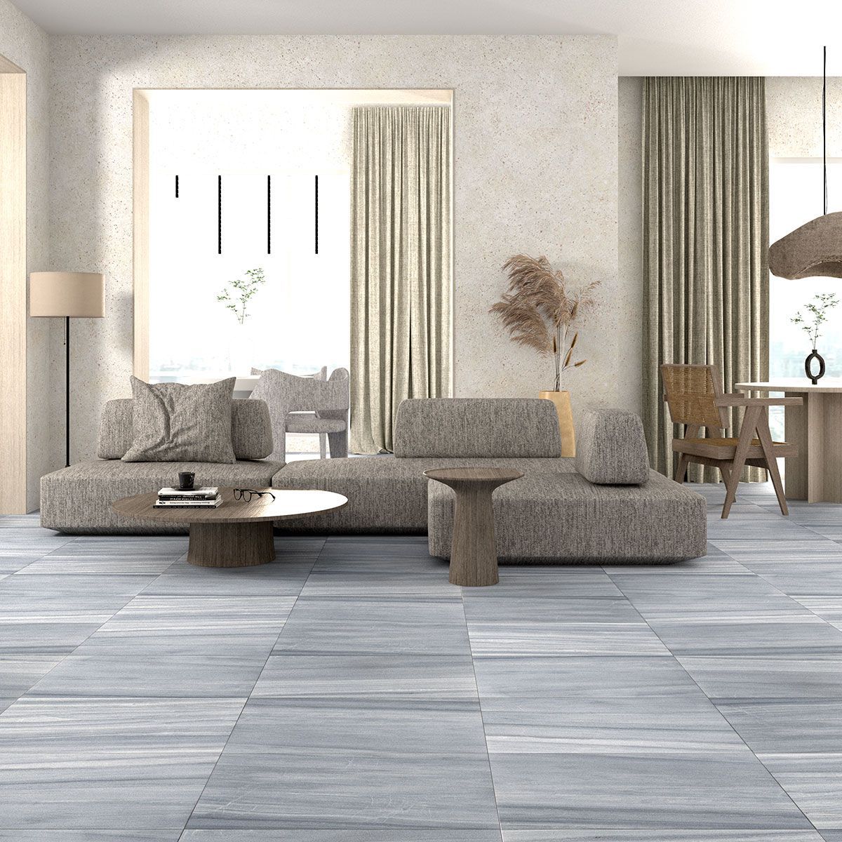 Living room with blue-gray tiled floor, textured sofa, wooden table, and neutral curtains.