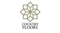 Logo for Country Floors: geometric star design in gold above company name in black text.