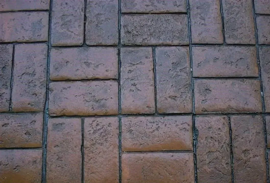 A close up of a brick floor with a grid pattern.