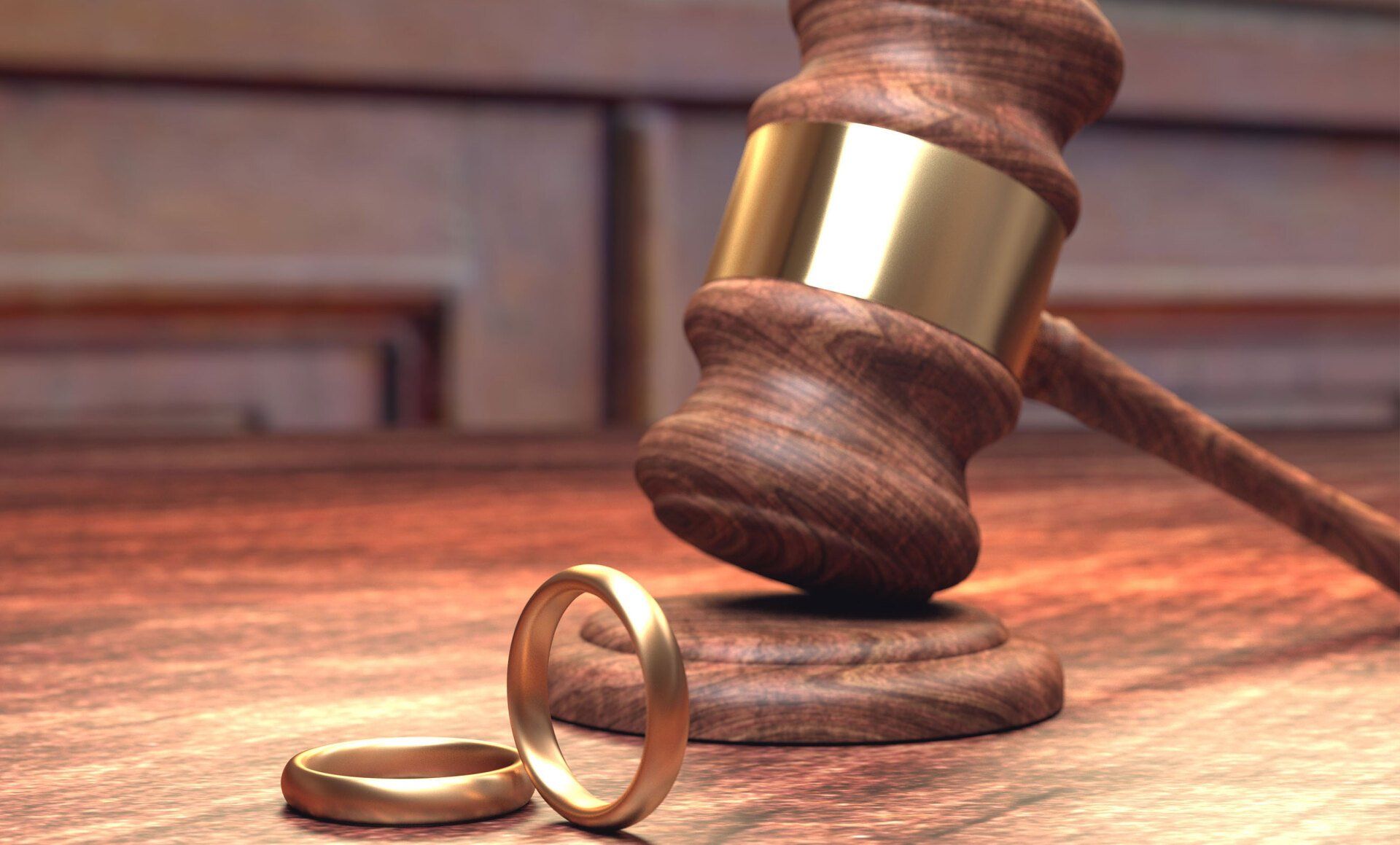 Learn More About Divorce / Family Law gavel and wedding rings